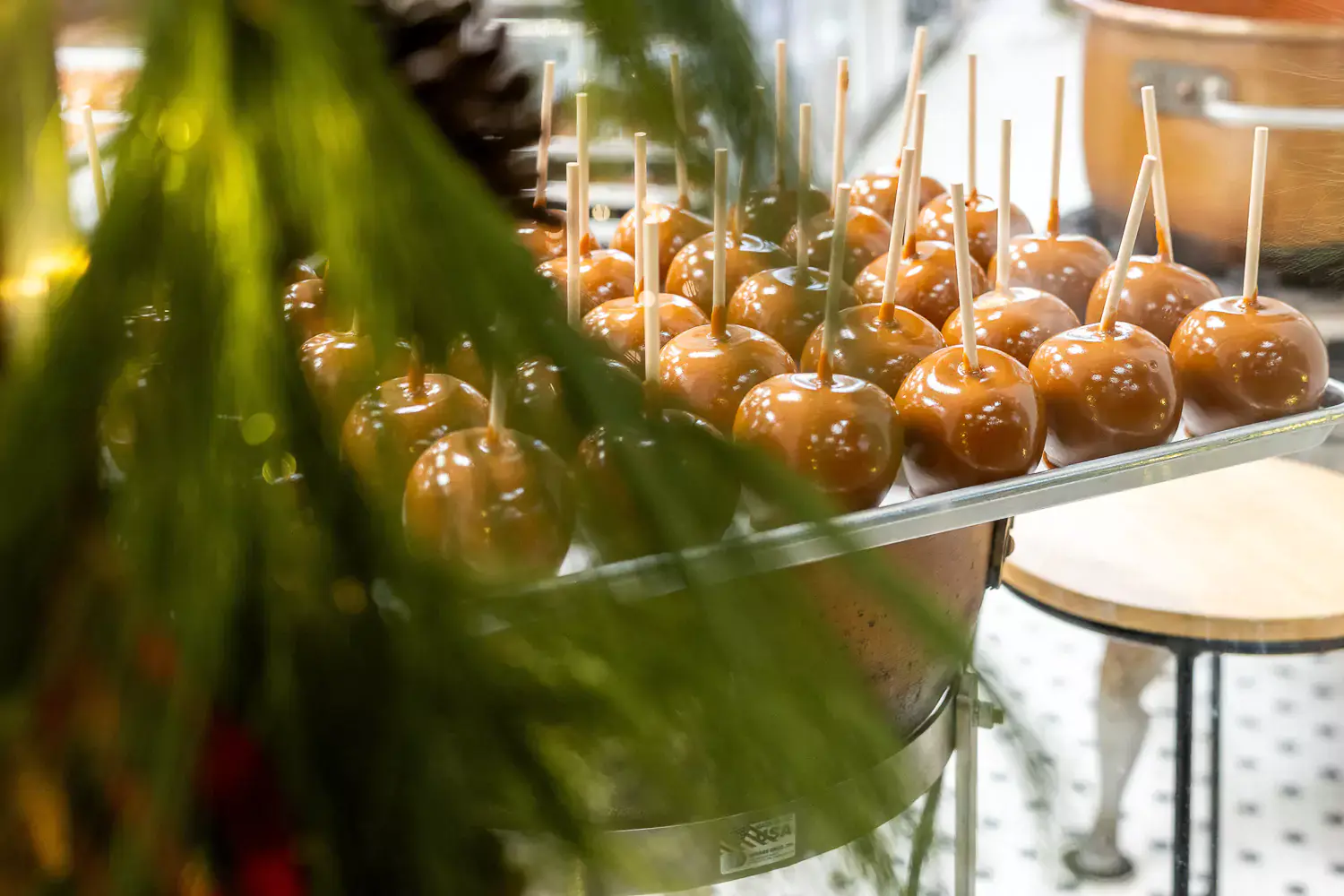 Close-up photo of caramel apples taken with the Tamron 35-150mm f/2-2.8 lens, highlighting depth of field and vibrant colors.